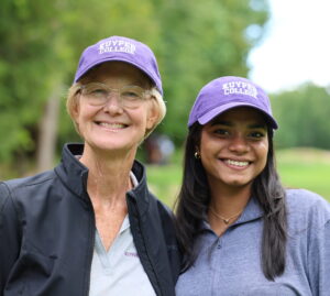 president harris and student at annual golf outing